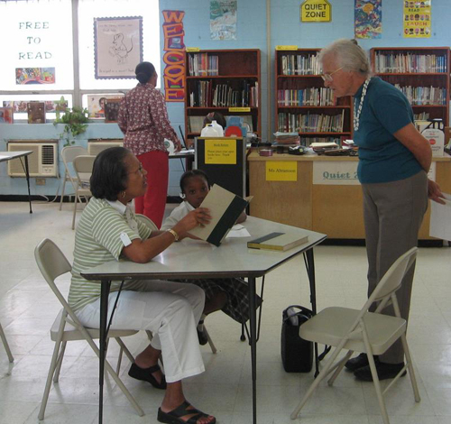 Figure 5: Retired University English professor and school librarian together build student literacy skills