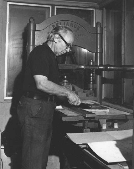 Figure 30: Photograph of Lynd Ward at the press